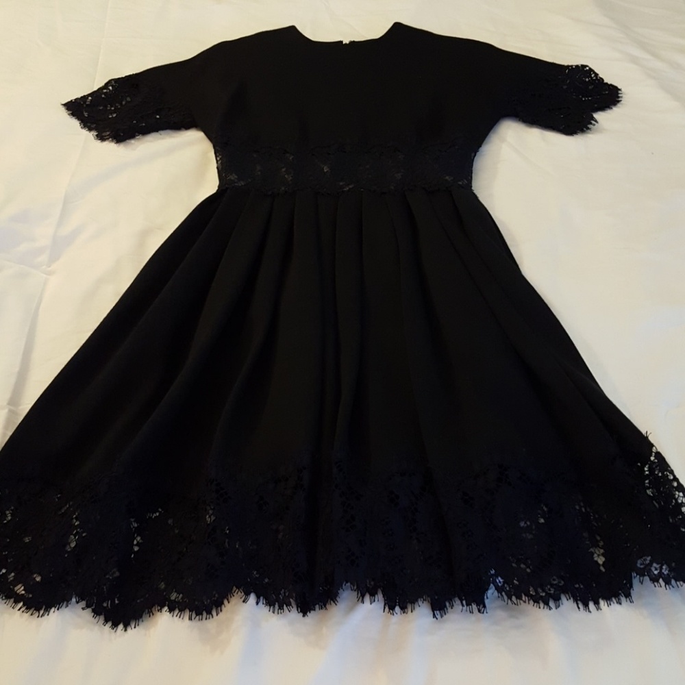 Carolyne Roehm black with lace dress