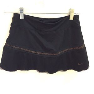 Black and gold NIKE skirt