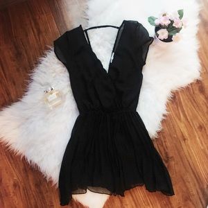 Sexy low cut black pleated romper NWOT