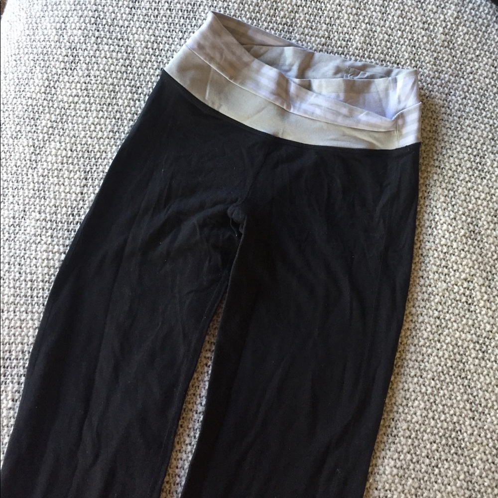 LULULEMON yoga pants, sm. hole in bottom left leg