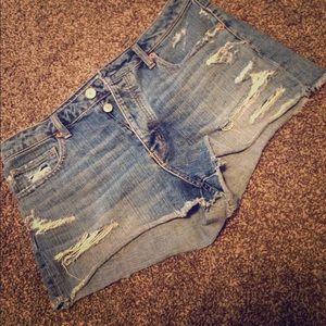 AE size 12 distressed jean shorts.
