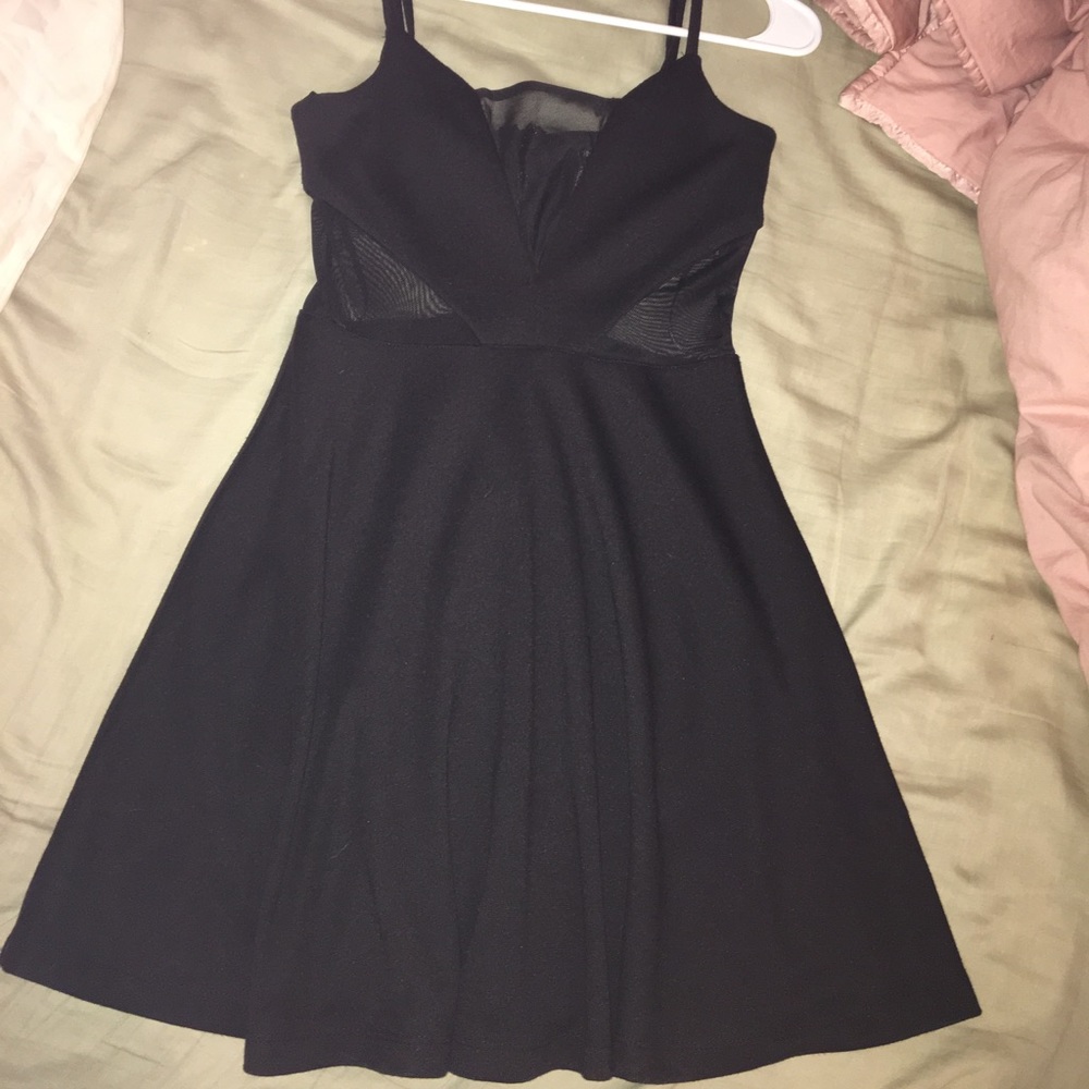 Black dress with top and side mesh