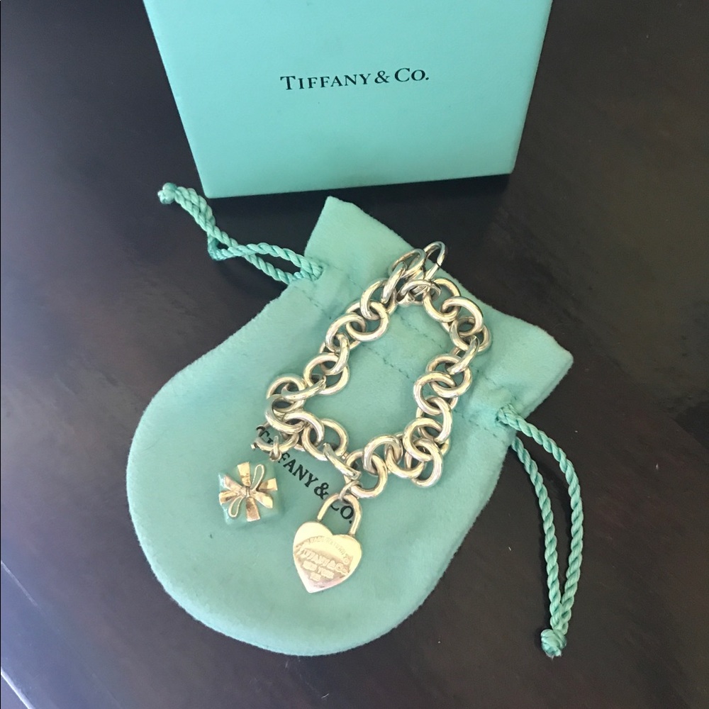 Tiffany & Co. charm bracelet with charms.