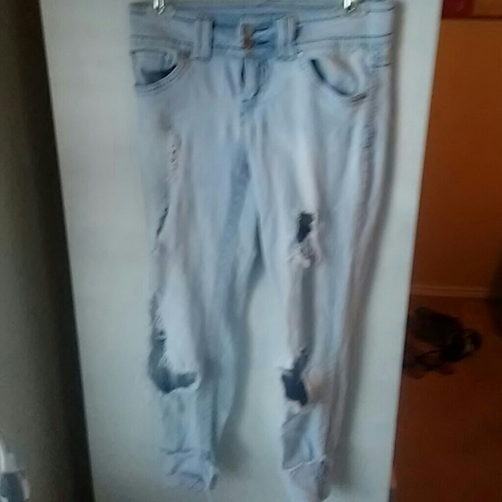 Faded blue riped jeans