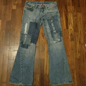 TRUE RELIGION Distressed Patchwork Denim Flares