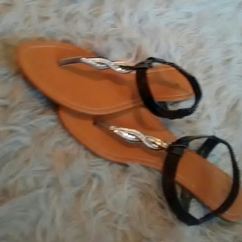 Brown and black sandals