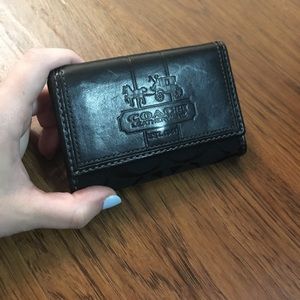 Black jacquard and leather trifold Coach wallet