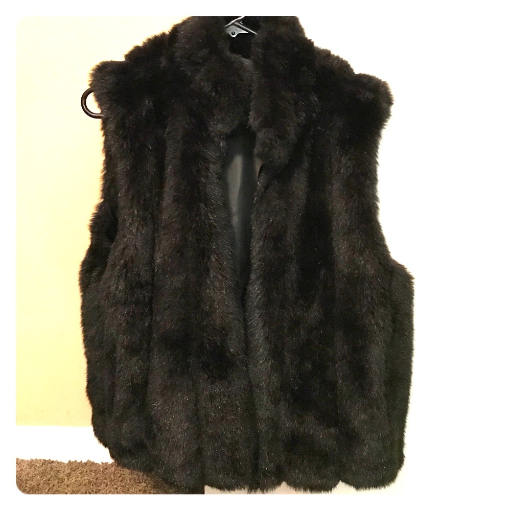 Flawless faux fur black vest.