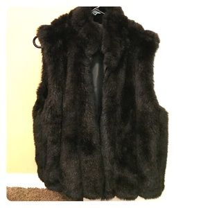 Flawless faux fur black vest.