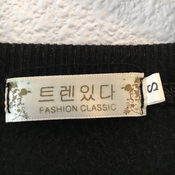 Black sweater. Never worn. - Picture 3 of 3