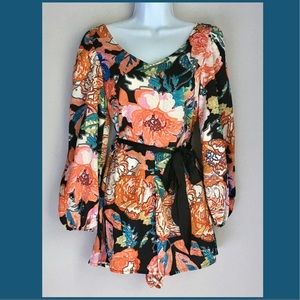 Floral Long Sleeve Romper!