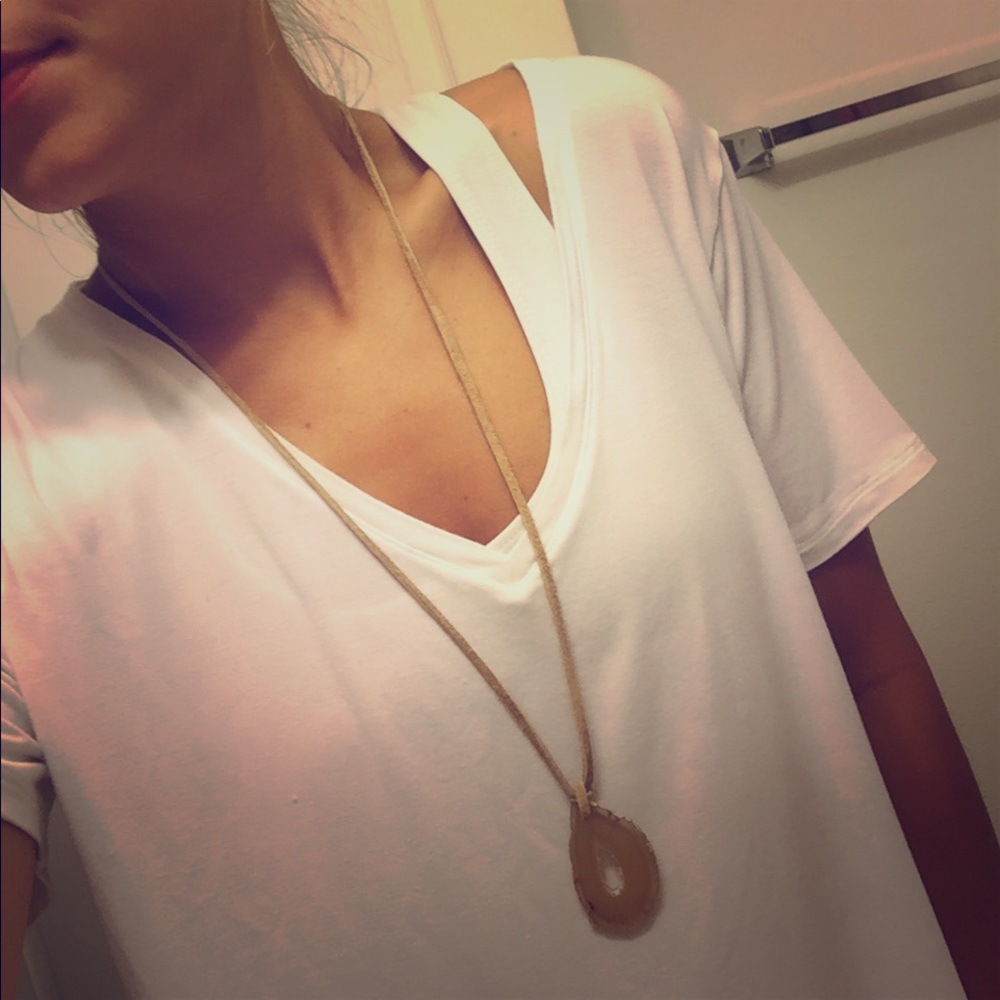 Tan stone necklace.