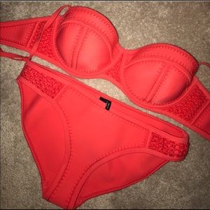 Red Triangl swim suit. Small ++ top. Medium bottom