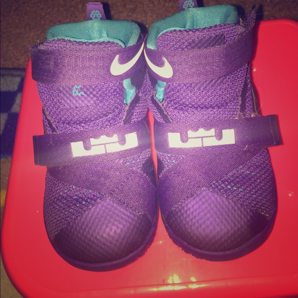 Purple and blue LeBron James basketball sneakers