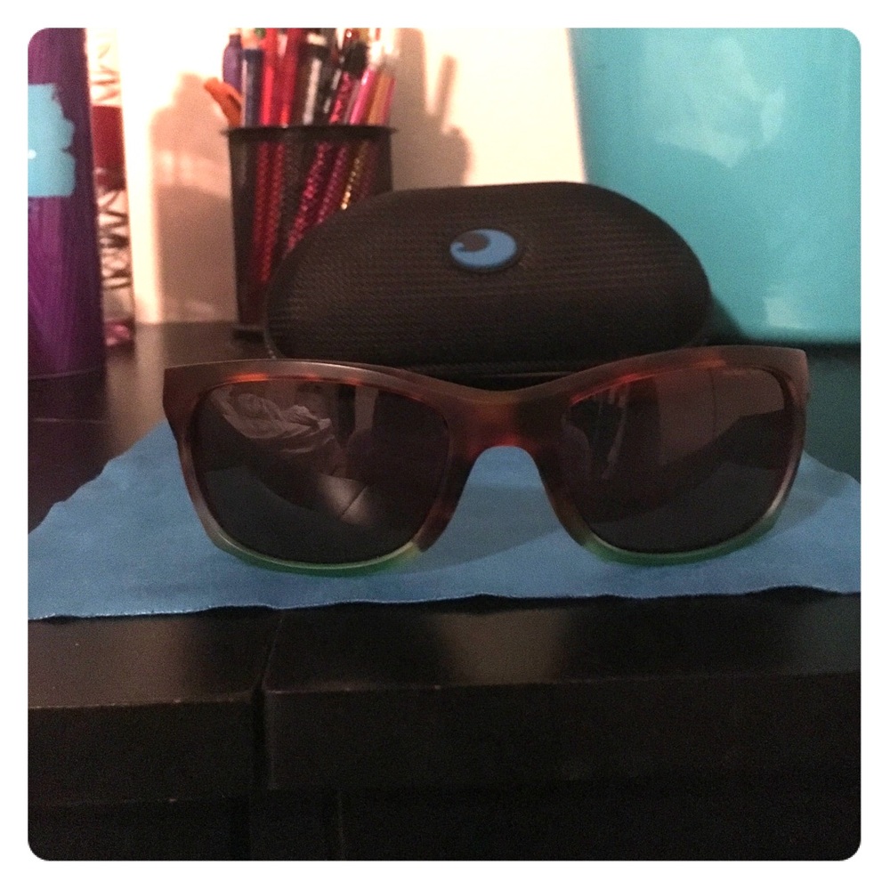 Women's Costa sunglasses with case and cloth.