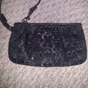 Coach black and silver zippered wristlet