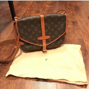 Authentic Louis Vuitton monogram Saumur 30.