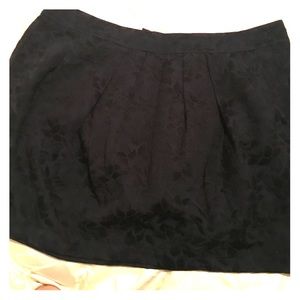 Navy mini skirt with flower patterns
