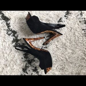 Black and leopard platform heels