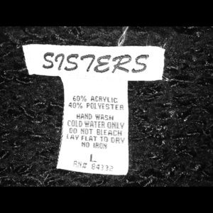 Black ruffled cardigan