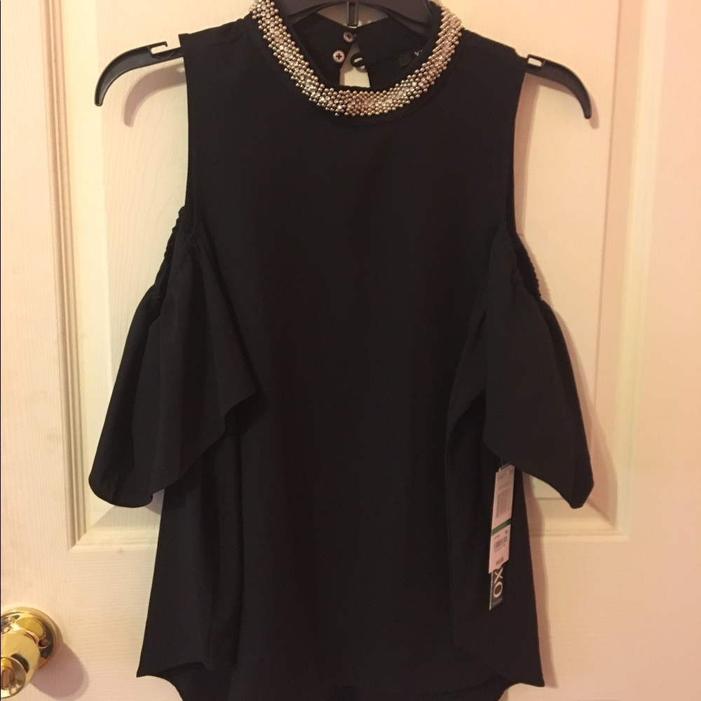 Beautiful black top with neckline detail