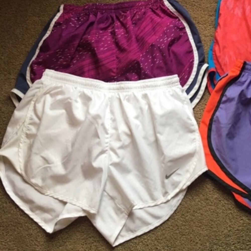 White Nike running shorts
