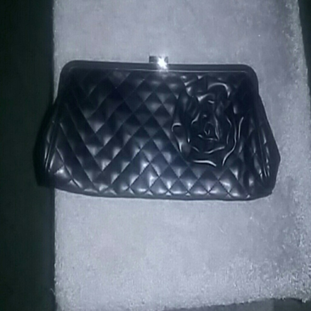Black quilted clutch