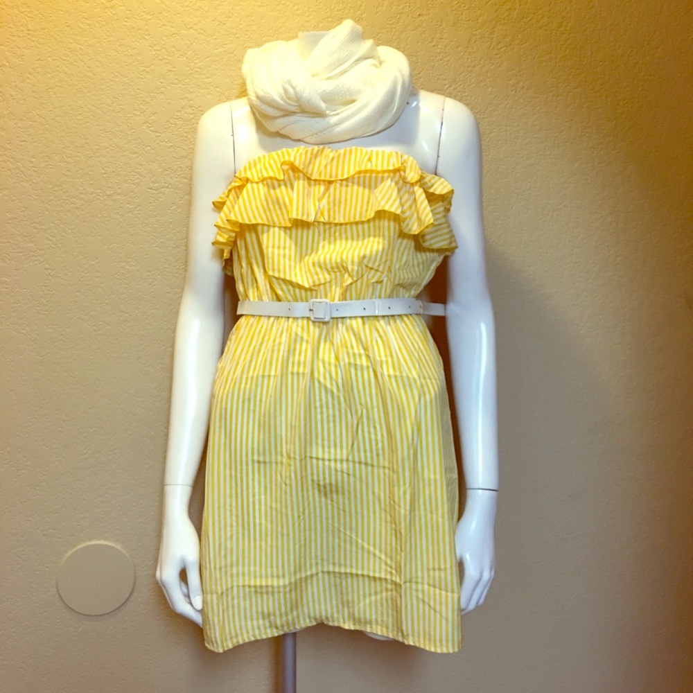 Yellow & white striped dress with white belt.
