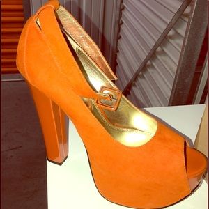 Orange Wild pair platform shoes