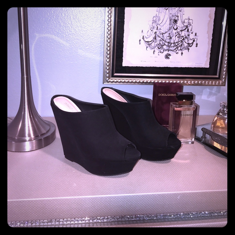 Black wedge bootie heel