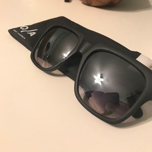 Quay "On the Prowl" black sunglasses!