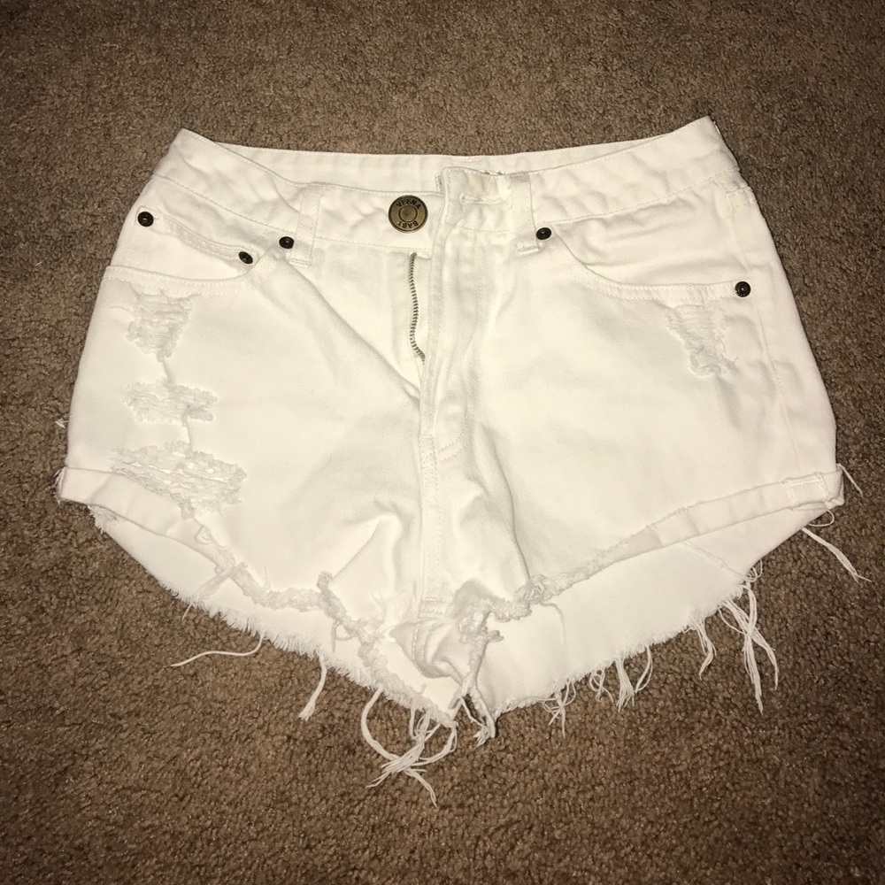 Ripped white denim high waisted shorts