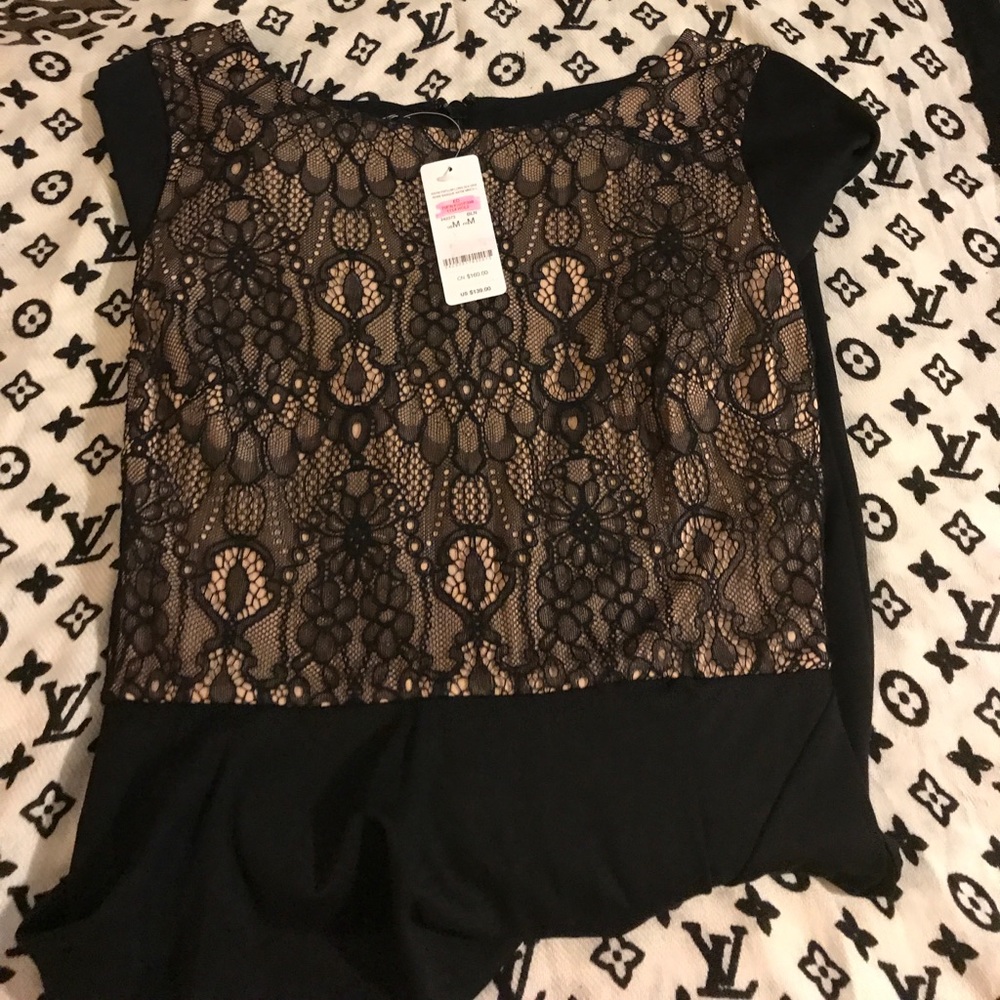 ASYM PEPLUM LONG SLV DRESS.