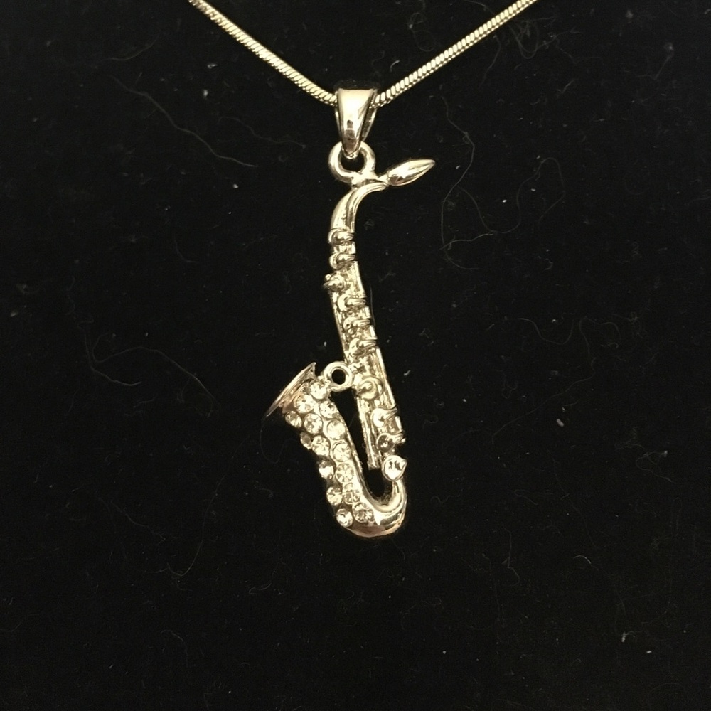 Silver saxophone necklace