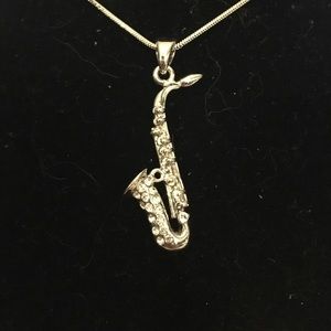 Silver saxophone necklace