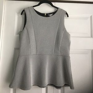 Black and white patterned peplum top