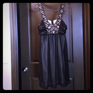 Black cocktail dress with stud detail