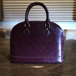 Louis Vuitton Alma Handbag
