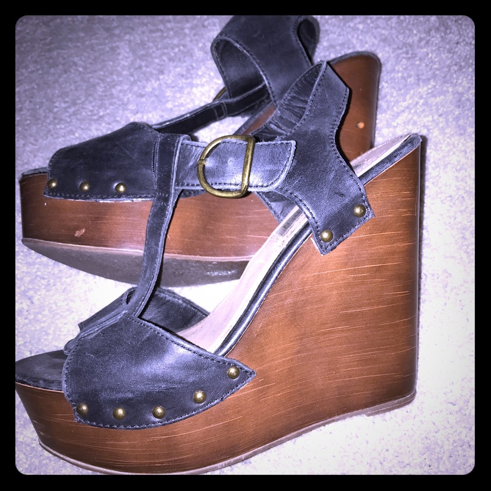 Black Steve Madden wedges with a wood platform