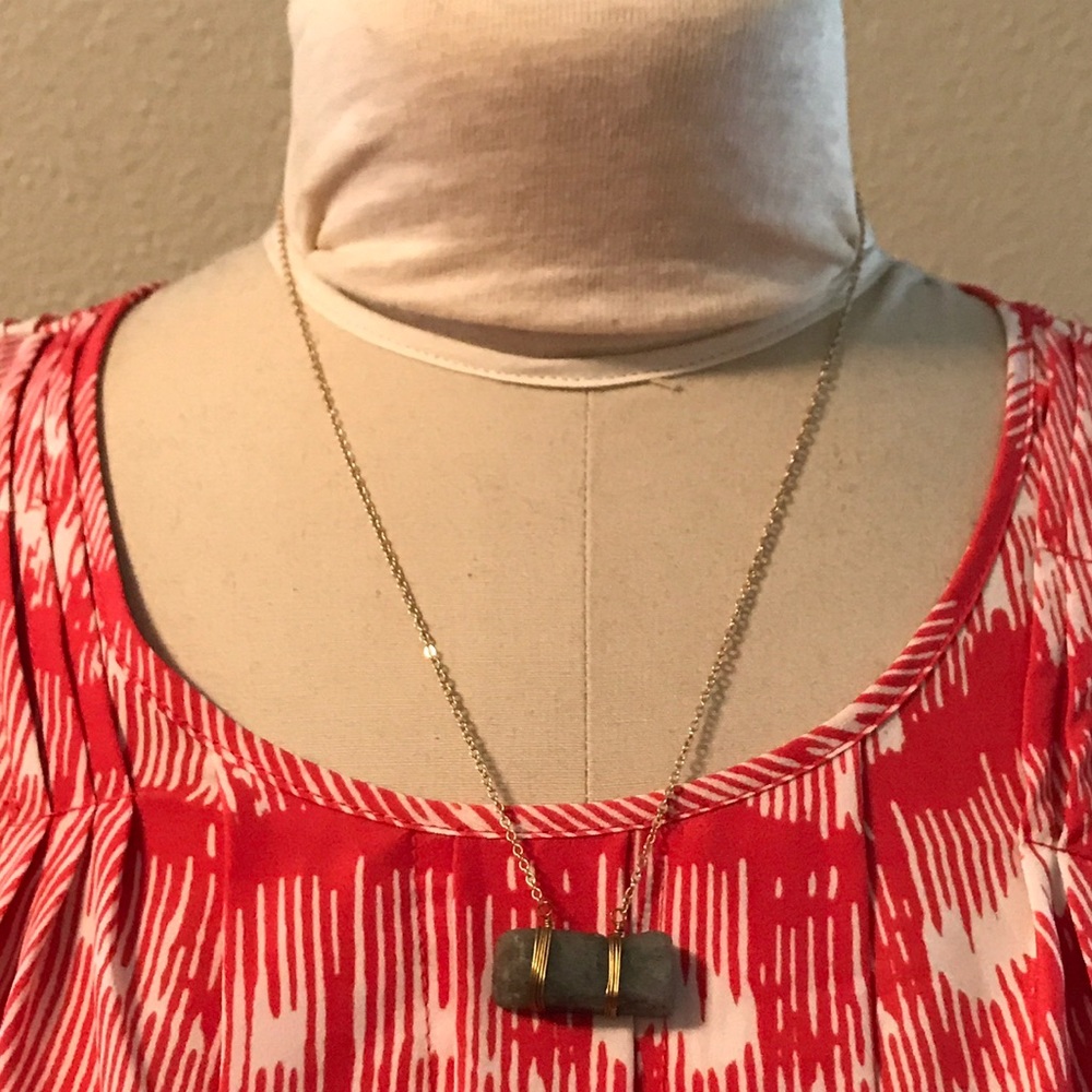 NWT gold tone necklace with green stone.