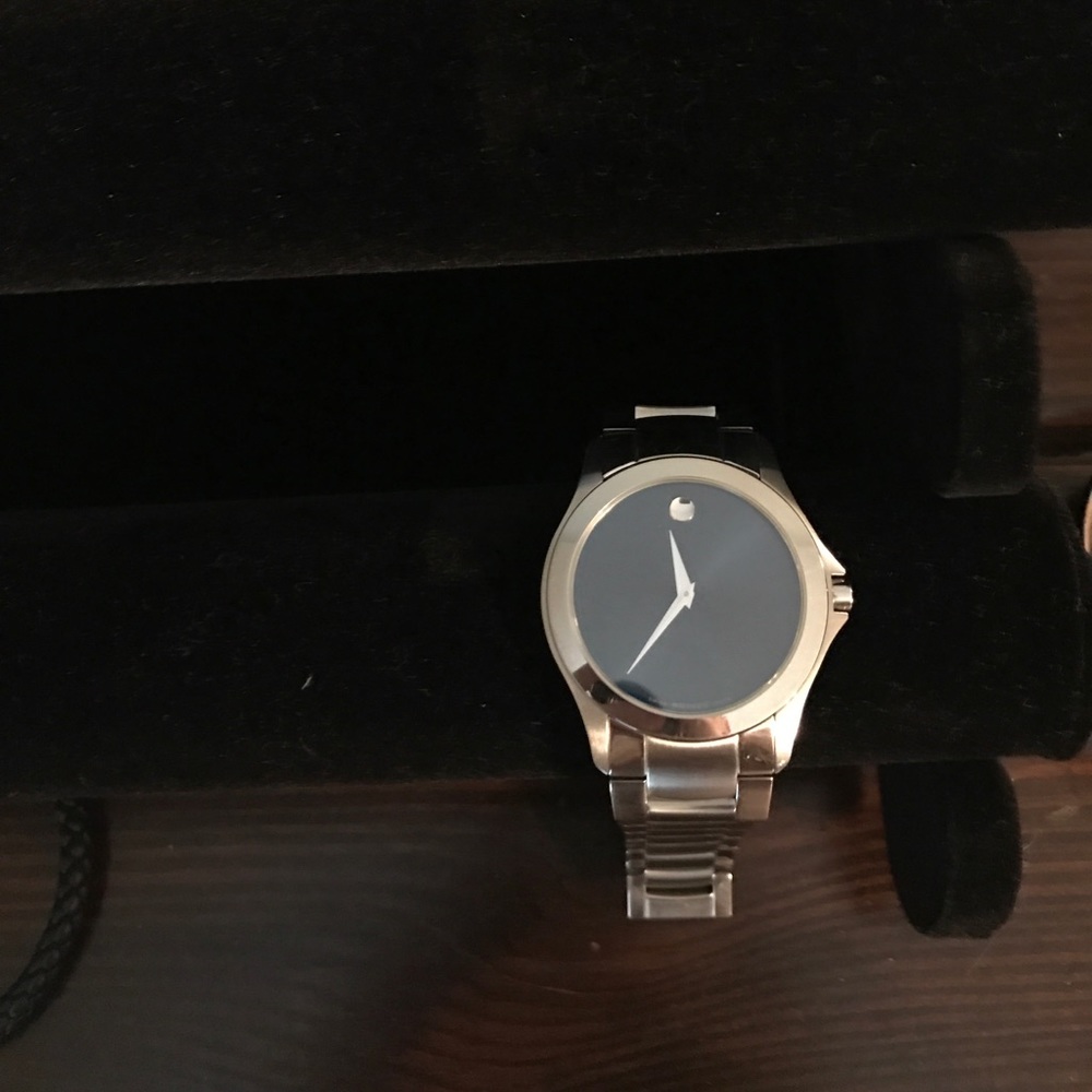Movado blue face watch