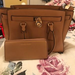 Authentic Michael Kors hand bag and wallet