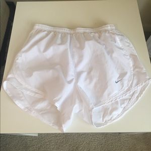 White Nike shorts