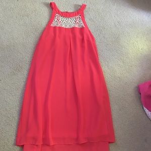 A. Byer orange dress.