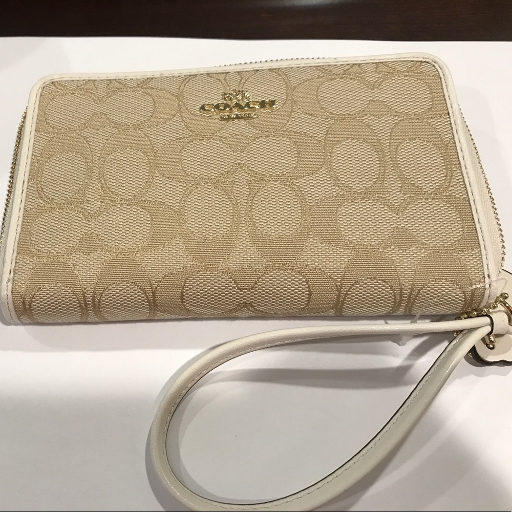 Brand new Coach wristlet.