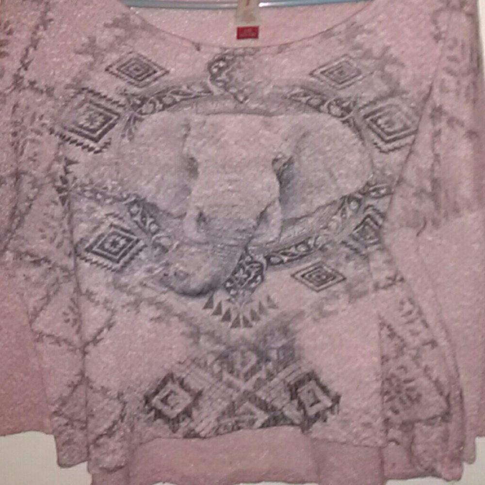 I am selling a soft elephant design shirt