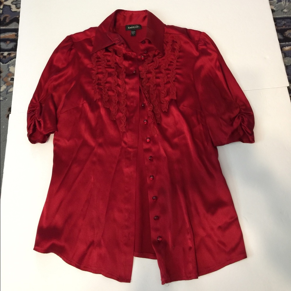 Ruby Red Bebe Blouse.  Ruffle front ruched sleeve