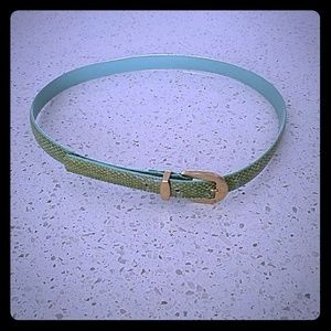 On trend green snakeskin belt