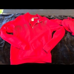 Red pink sweater.