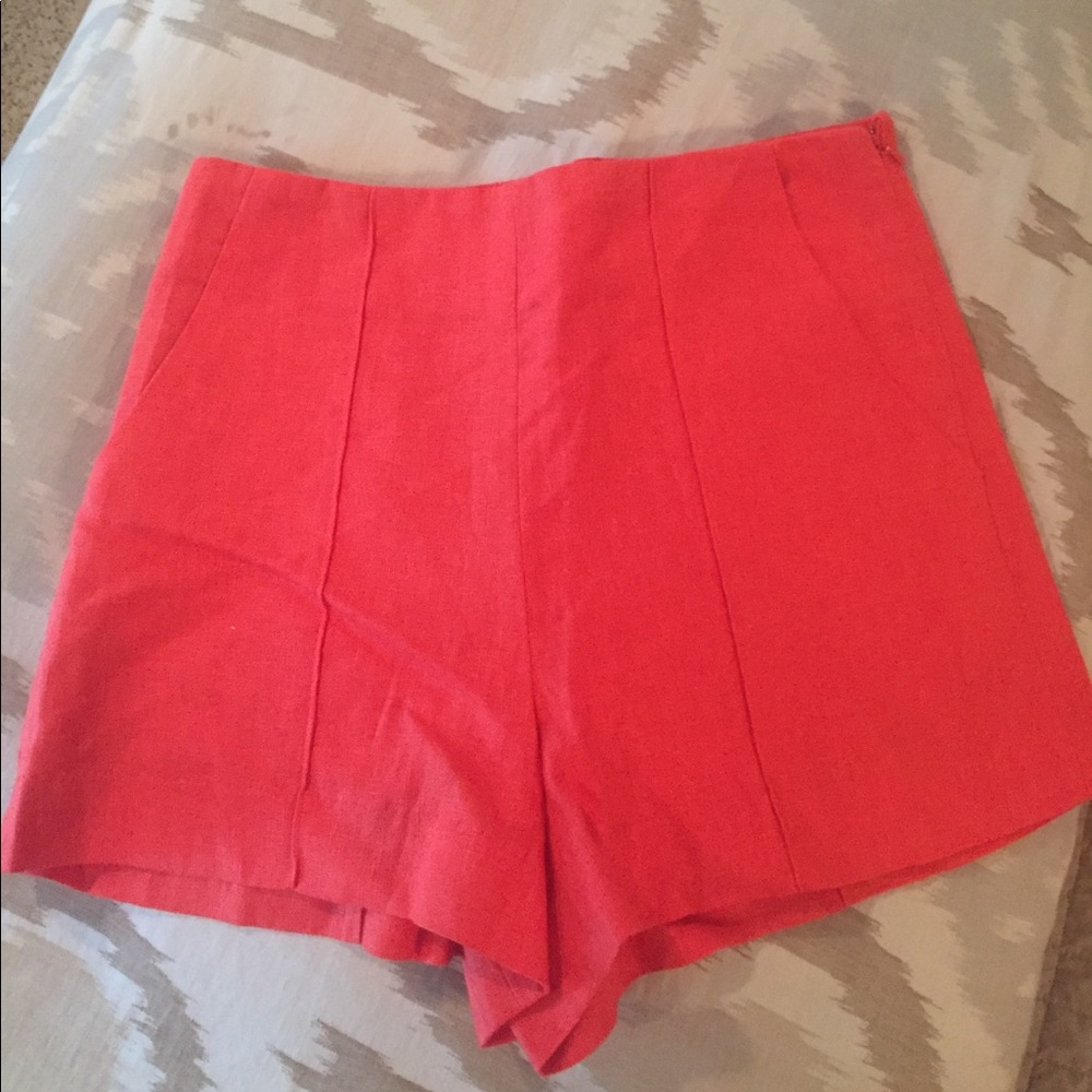 High waisted red/coral shorts